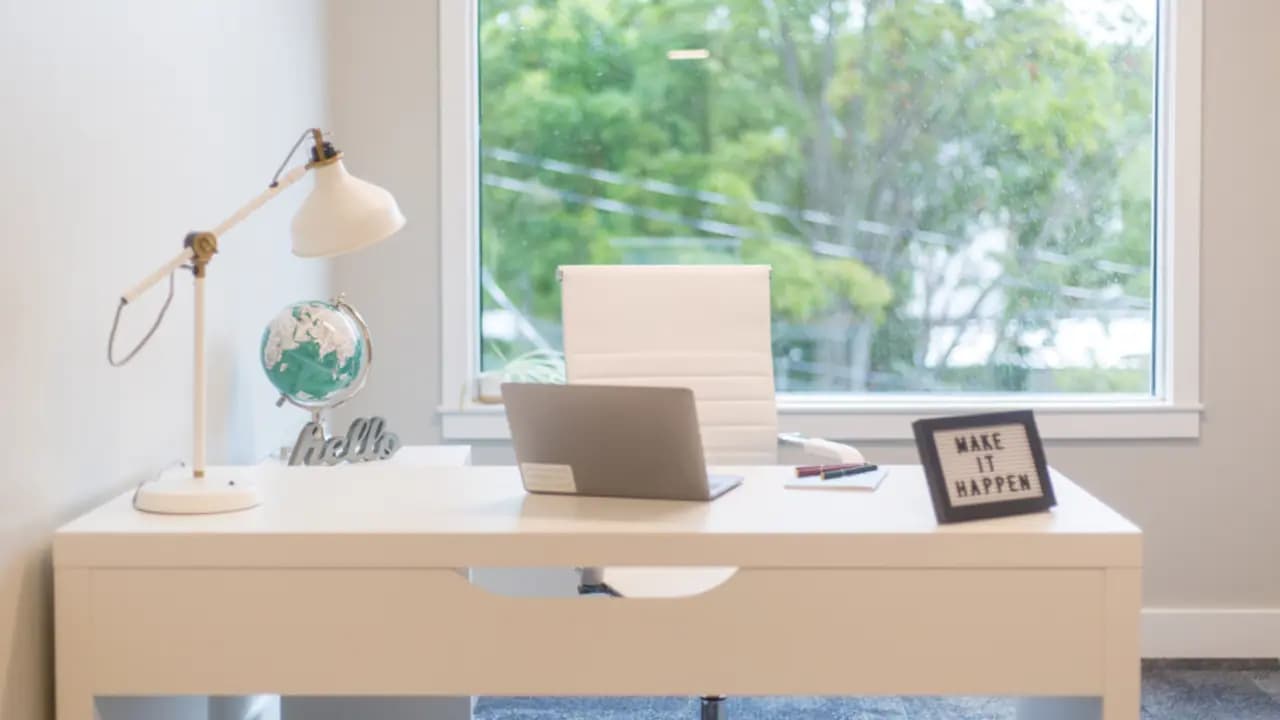 A school office desk with the day’s paperwork on it